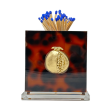 Load image into Gallery viewer, Matches with blue tips in a decorative holder featuring a gold coin design on a tortoiseshell background.