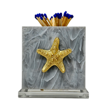 Load image into Gallery viewer, Marble matchbox holder with gold starfish design on a white background
