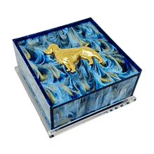 Load image into Gallery viewer, Decorative box with a gold dog figurine on a blue floral background