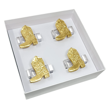 Load image into Gallery viewer, Set of gold cowboy boot napkin rings in a white box on a white background