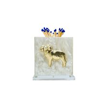 Load image into Gallery viewer, Match striker with gold ram design on a white marble base