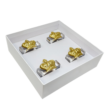 Load image into Gallery viewer, Set of four gold and silver decorative items in a white box on a white background