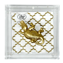 Load image into Gallery viewer, Gold alligator figurine on a white lattice background with 'ihr' branding.
