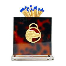 Load image into Gallery viewer, Matches with a decorative holder featuring a gold lock design on a tortoiseshell pattern.