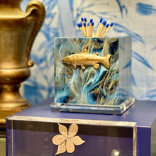 Load image into Gallery viewer, Decorative match holder with fish design on a blue surface, branded 'Southern Tribute'.
