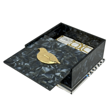 Load image into Gallery viewer, Decorative box with a gold bird emblem on a white background
