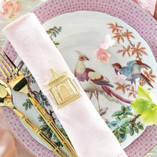 Load image into Gallery viewer, Decorative table setting with a plate, fork, knife, and napkin on a floral tablecloth.
