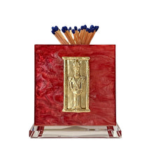 Load image into Gallery viewer, Red matches holder with gold emblem on a white background
