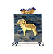 Load image into Gallery viewer, Matchbox holder with ram design and matches on a white background
