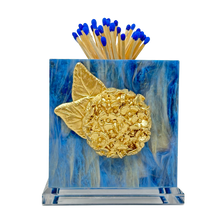 Load image into Gallery viewer, Matches with blue tips in a decorative holder with a gold leaf design on a blue background
