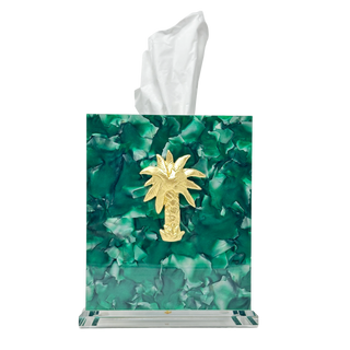 Tissue box cover with green leaf pattern and gold palm tree design on a white background