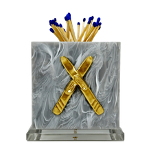 Load image into Gallery viewer, Marble matchbox with skis a white background
