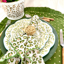 Load image into Gallery viewer, Decorative table setting with green and white plates, napkins, and cutlery on a green tablecloth.
