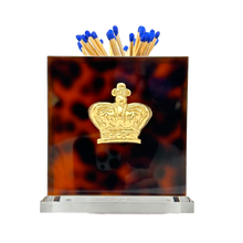 Load image into Gallery viewer, Matches in a holder with a gold crown emblem on a tortoiseshell patterned background
