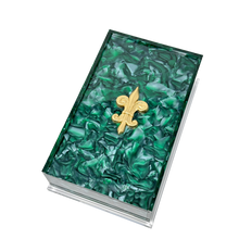 Load image into Gallery viewer, Green decorative box with a gold emblem on a white background
