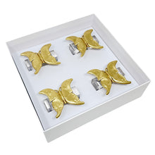 Load image into Gallery viewer, Set of gold butterfly-shaped napkin rings in a white box
